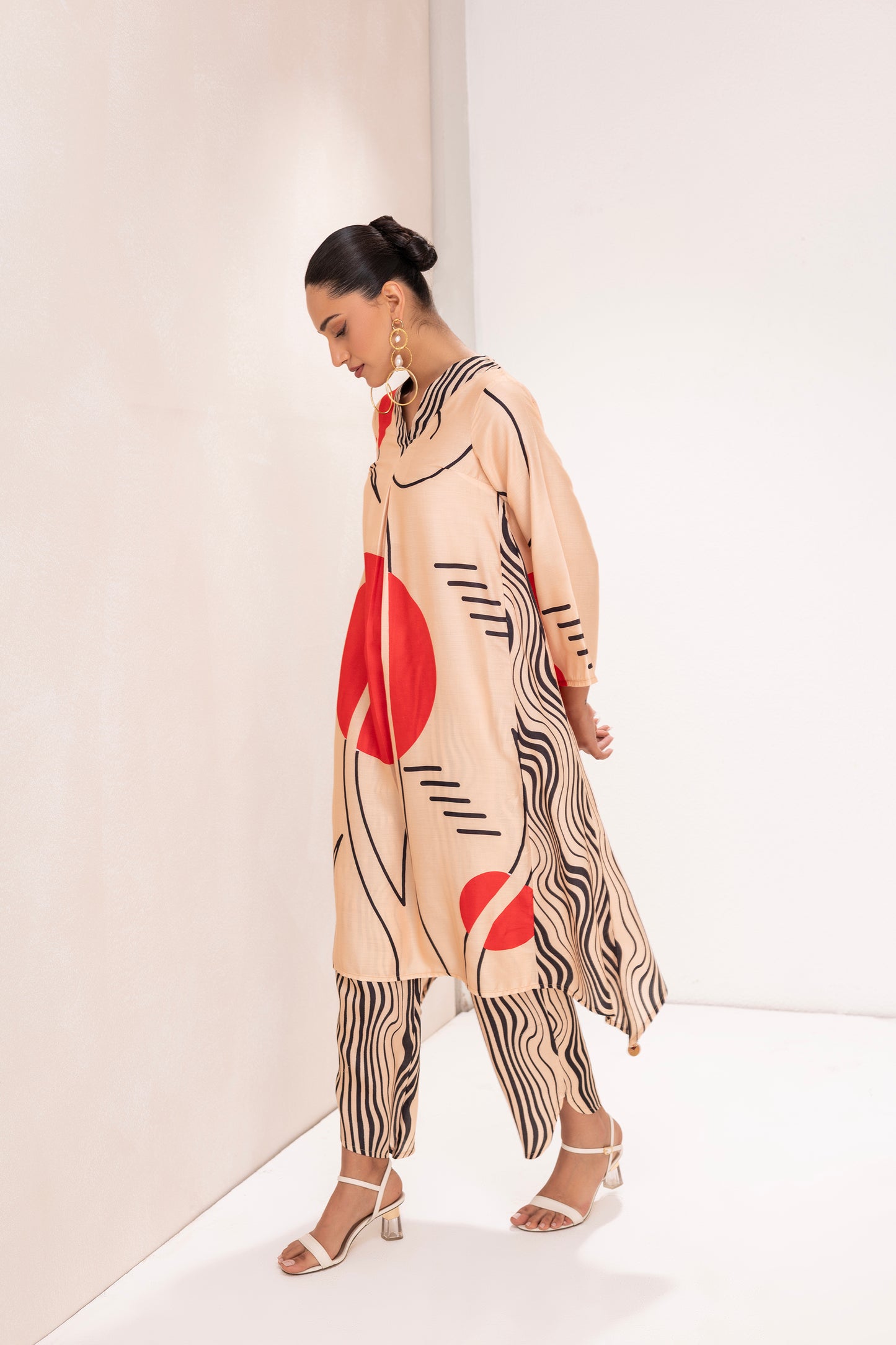BEIGE AND RED ABSTRACT PRINT KURTA SET