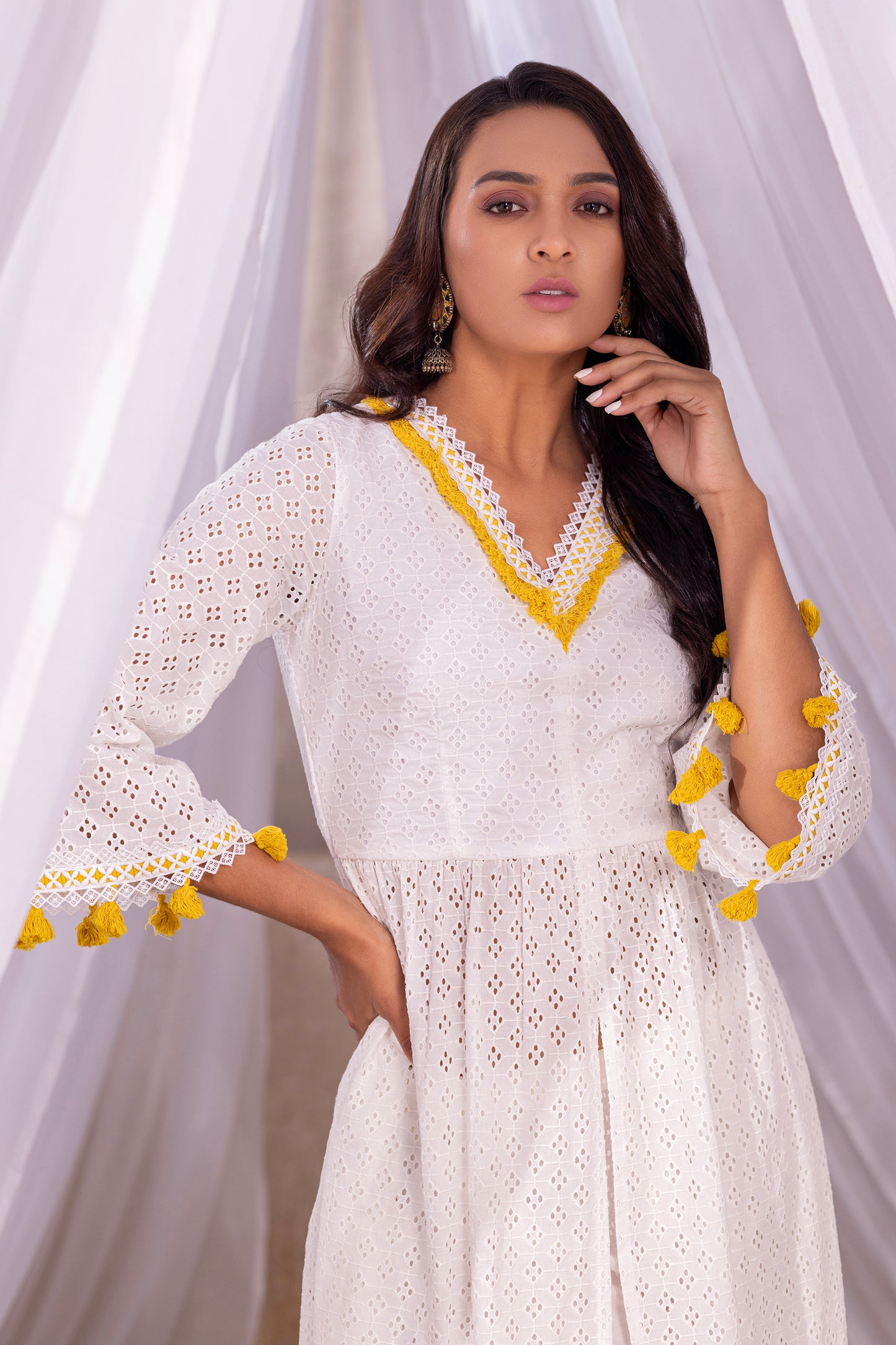 White kurta With Yellow Tassel Detailings